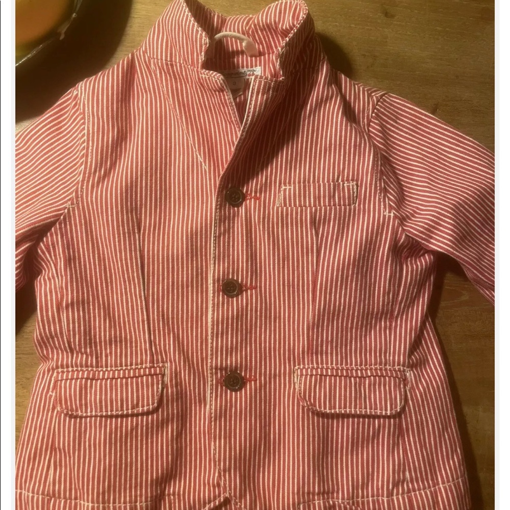 Bonpoint beautiful Jacket. I bought it for my son and he looked adorable in it.